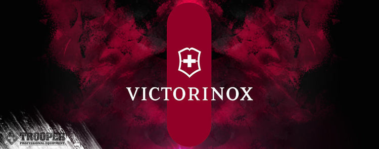Logo von Victorinox auf rot-schwarzem Grund.